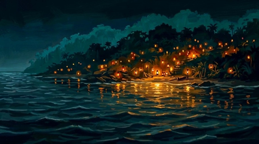 Lanterns lit along the island shore at night